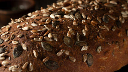 Close-up surface of homemade whole grain bread, food background