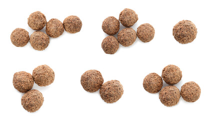 Set with delicious sweet chocolate truffles on white background, top view