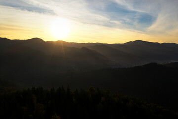 Picturesque view of mountain landscape and beautiful sky at sunrise. Drone photography