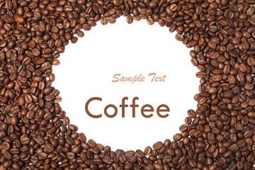 Many roasted coffee beans on white background, top view. Space for design
