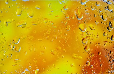 water drops on yellow background