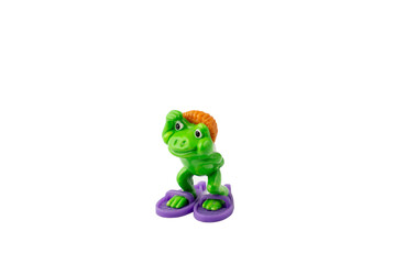 Frog figure plastic toy on a white isolated background