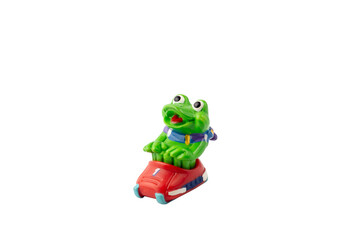Frog figure plastic toy on a white isolated background