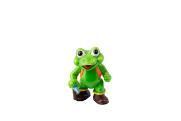 Frog figure plastic toy on a white isolated background