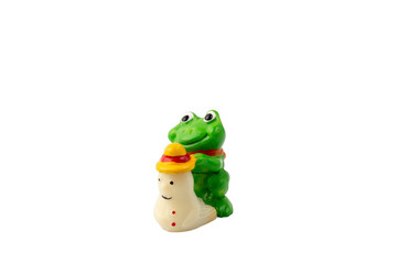 Frog figure plastic toy on a white isolated background