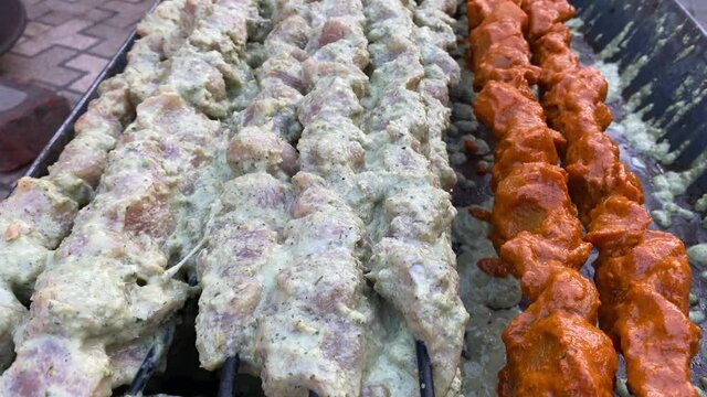 Close up shot of Seekh kabab and reshmi kabab prepared in traditional style at home in India.