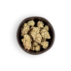 Dried cannabis, marijuana buds, in a bowl. Isolated on white.
