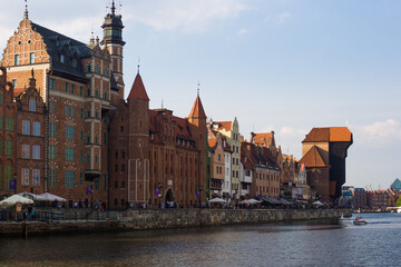 Fototapeta na wymiar Beautiful architecture of the old town in Gdansk. Poland Houses, buildings, catholic church, panorama landscape.