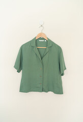 beautiful woman shirt hanging on wall