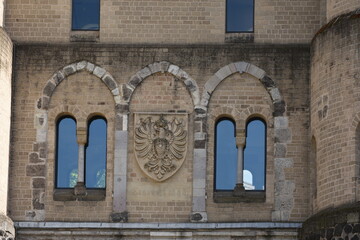 emblem and windows on Hahnen Gate - Hahnentorburg (Stadttor) in Rudolfplatz in Cologne, Germany, 2017 