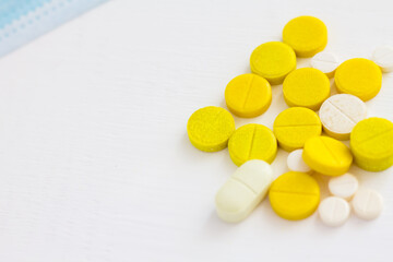 yellow and white pills for viral diseases. Disease treatment, antibiotics