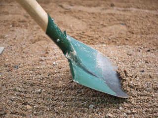 shovel on sand for gardening