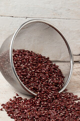 Red bean in a silver sieve.
