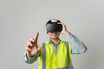 Selective focus hand. Asian man Architect or Engineer designer using VR headset with joystick for design working in studio short gray background.