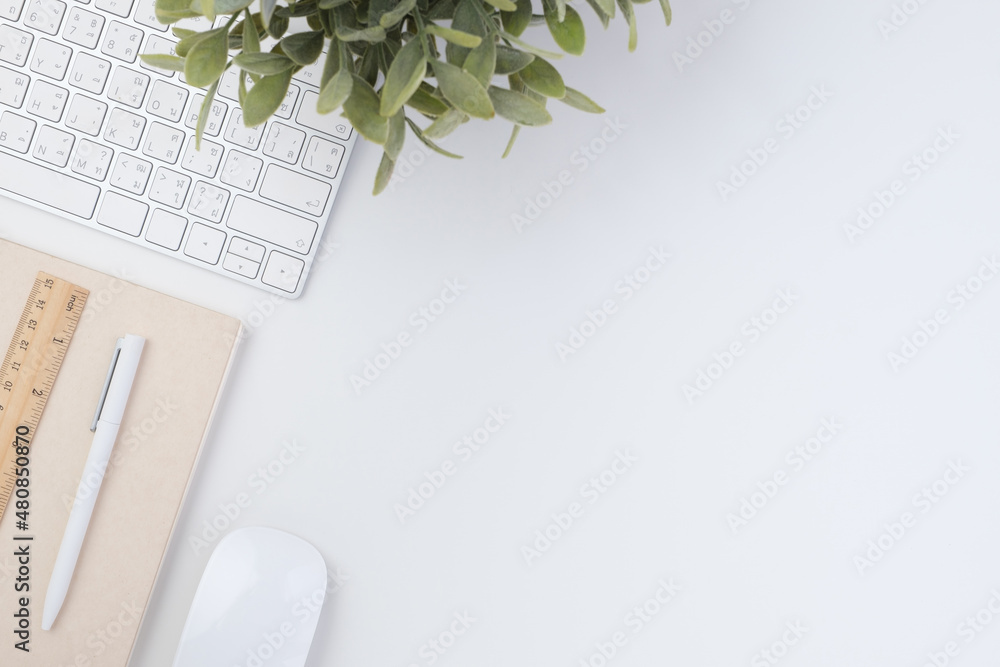 Poster top view working desk with keyboard mouse and notebook on white table backgorund