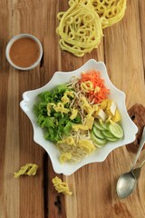 Asinan Betawi. Preserved Chinese Cabbage, Cabbage, Bean Sprouts, Tofu, and Lettuce served with Peanut Sauce and Krupuk.