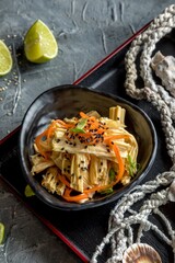 Soy asparagus Fuzhu with spicy Korean-style carrots and sesame, marinat