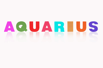 Name AQUARIUS is in 12 Zodiac isolated on white background. Colorful wooden alphabets set sort. English letter made of wood arrange alphabet as categorize suitable for children. Poster, banner design.