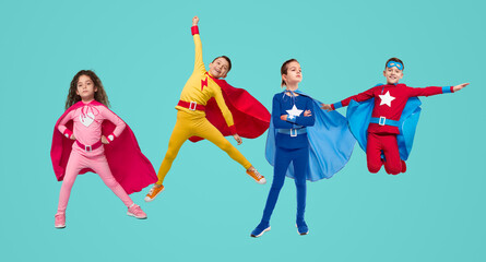 Company of superhero kids on blue background