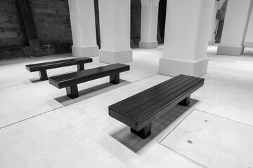 Row of empty seat and column in historical building