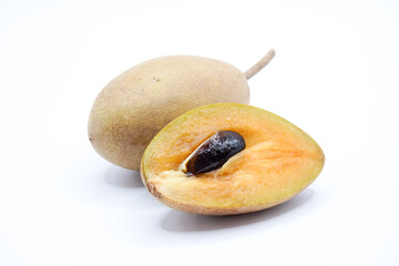 Fresh sapodilla fruit isolated on white background.