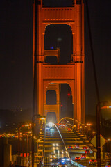 Golden Gate bridge at night with traffic