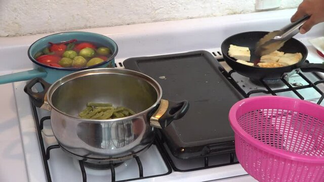 Food cooking on a stove