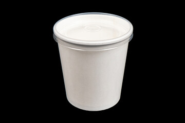 Side view white empty disposable paper cup isolated on black background. Paper cup isolated. Paper cup with cap