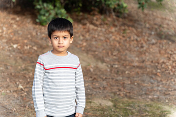 child playing in the park on a beautiful day