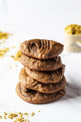 Protein homemade chocolate chip cookies on white marble background. Pea protein recipe.