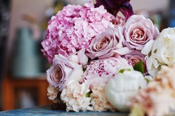 Fresh pink wedding bouquet made in flower shop