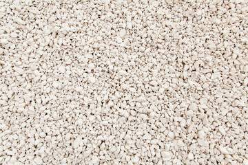 Quarry stones sorted fraction. Background from crushed stones for for construction of roads or cement