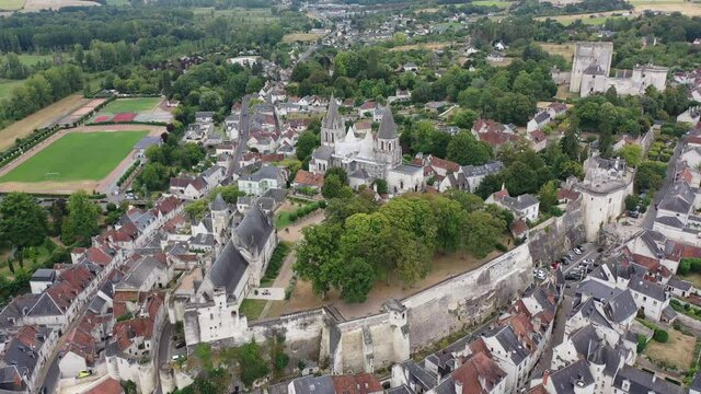 Aerial view of historic center of Loches town overlooking ancient Chateau of Anjou family with collegiate church, royal lodge and donjon, France