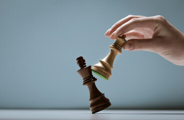 Player defeating his opponent and winning at chess - obrazy, fototapety, plakaty