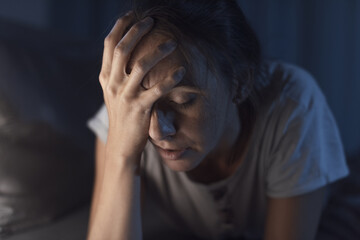 Fototapeta premium Desperate woman suffering from insomnia