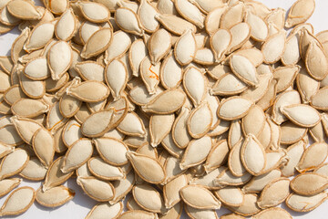 close up brown pumpkin seeds.
