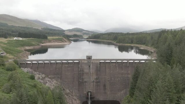 Flying over Laggan Dam, located on the River Spean south west of Loch Laggan in the scottish highlands.