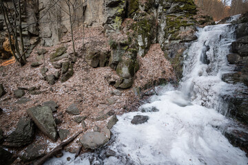 Obraz premium Frozen Starohutsky waterfall near Nova Bana, Slovakia