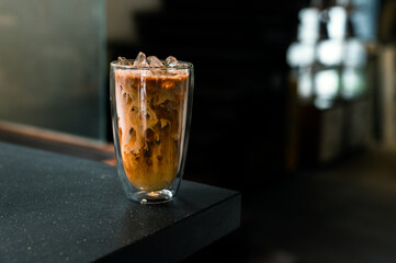 glass of coffee with milk on the table