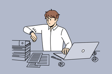 Business deadline and overwork concept. Stressed young businessman worker sitting in office at laptop with heap of papers looking at watch vector illustration 