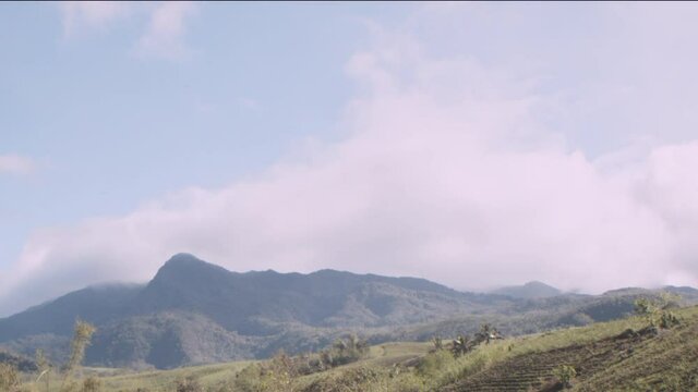 A bright, sunny, yet cloudy day on the mountains of Murcia in Negros Occidental, Philippines.