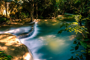 Long exposure exotic  beautiful tropical deep rainforest waterfall   Fresh turquoise waterfalls in deep forest of Huay Mae Khamin waterfall in the national park Beautiful landscape waterfalls 