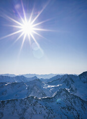 sunshine over the mountains in hochgurgl