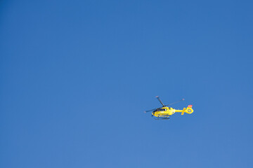 Fototapeta na wymiar helicopter in the sky over austria