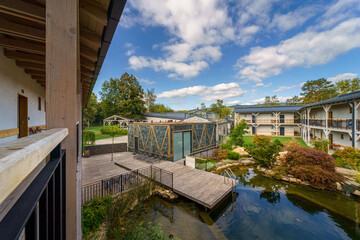 View from terrace of modern hotel with garden pond