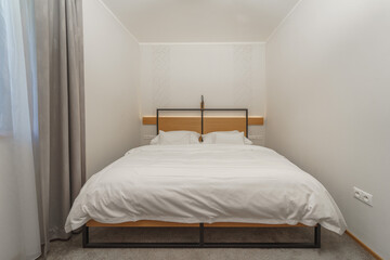 Fototapeta na wymiar Interior of modern bedroom suite in hotel