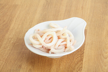 Marinated squid strips in the bowl