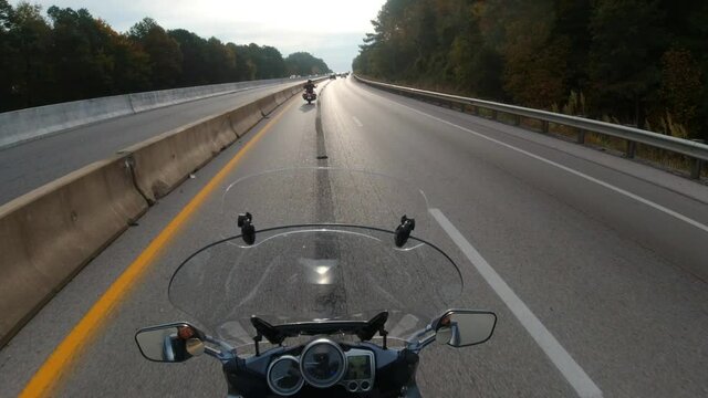 Motorcycle Touring Through Mountains Rider View