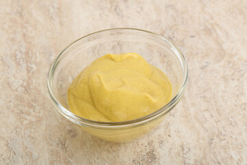 Organic mustard sauce in the bowl