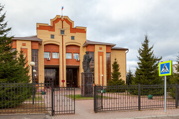 Courthouse in the city of Podolsk, Russia. On the wall of the building there is a sign with an...